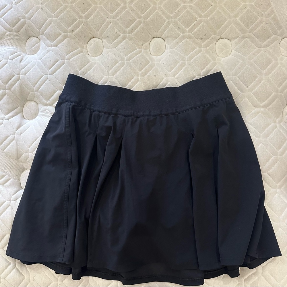 black pleated tennis skirt
